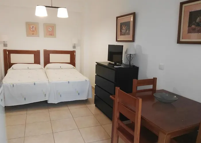 Apartamentos El Barrio